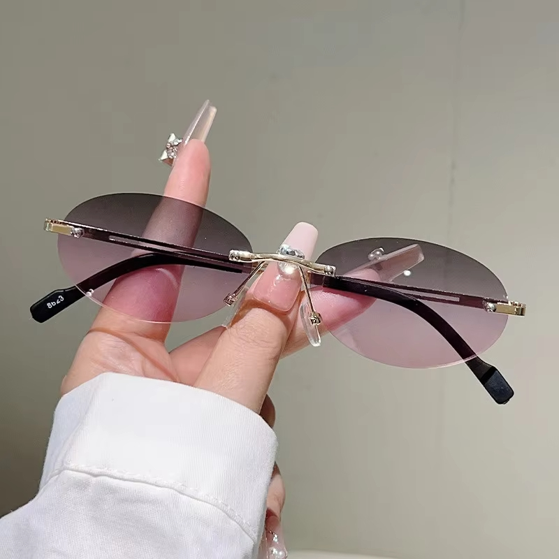 Rimless Oval Sunglasses Pink G - Vintage Fashion Definition recension och pris