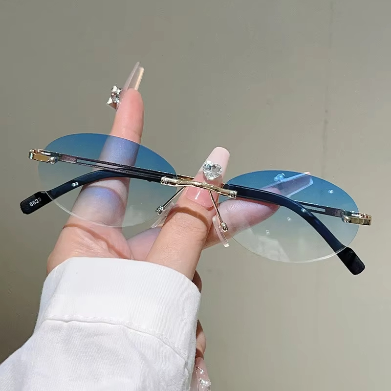 Rimless Oval Sunglasses Pink G - Vintage Fashion Definition recension och pris